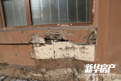 哈尔滨群力家园:楼房墙体多处破损质量堪忧 消